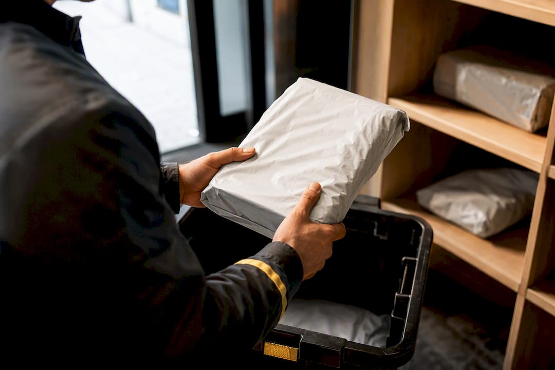Courier collecting a same-day return parcel