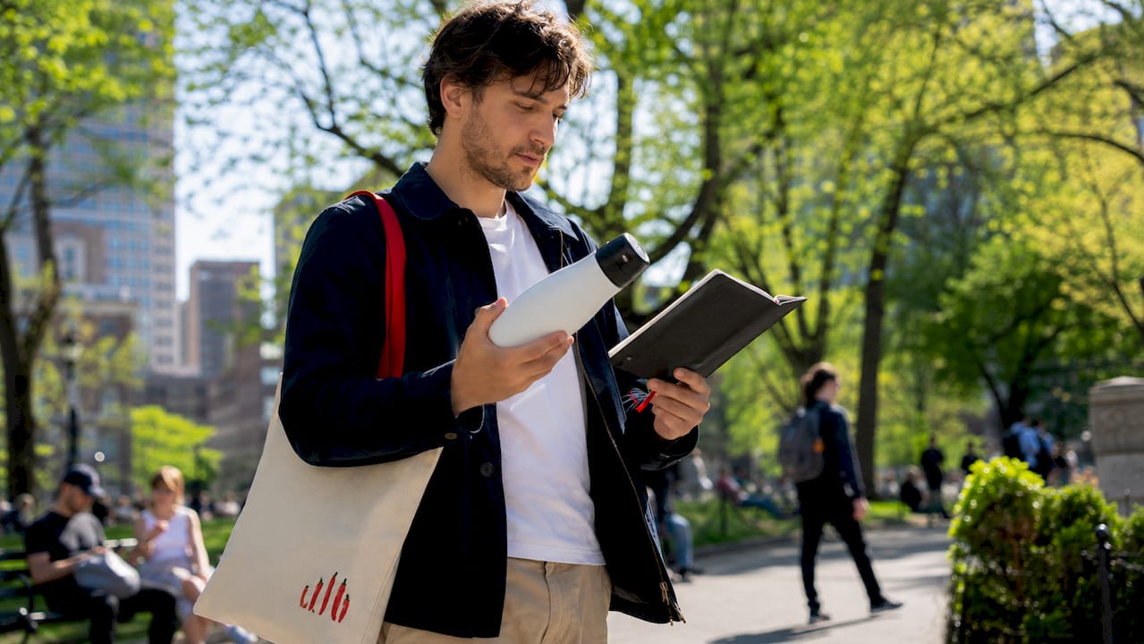 Marketing professional inspecting branded merchandise samples