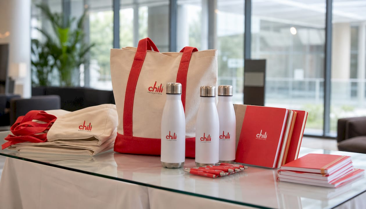 Branded merchandise displayed on university open day table