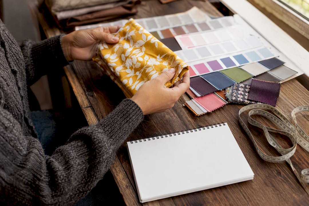 Close-up of hands inspecting promotional product sample