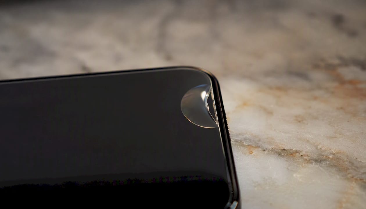 Bubble forming beneath screen protector