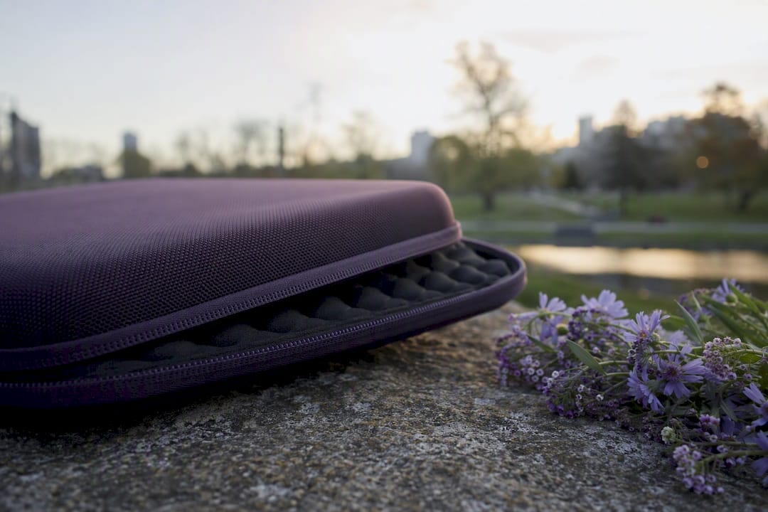 Rigid laptop case edge showing padding