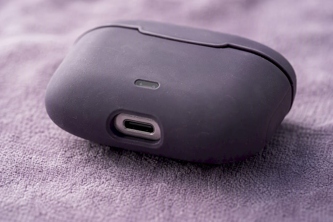 Close-up of charging port cutout on AirPods protective case