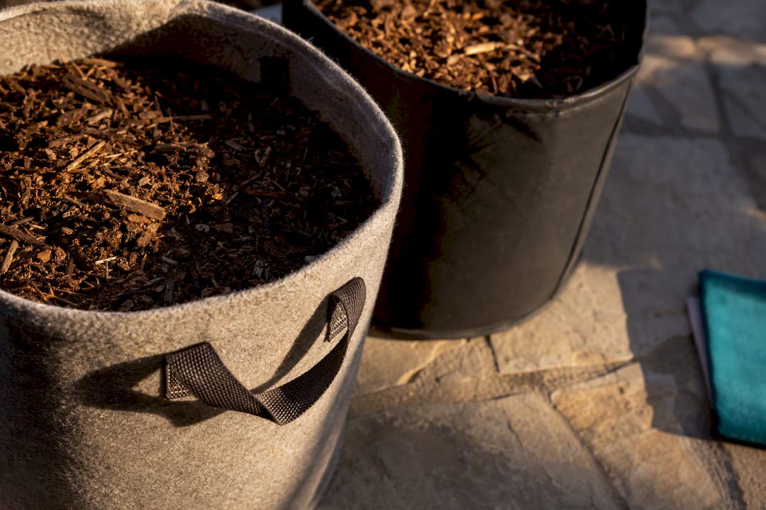Macetas de cultivo con acolchado protector