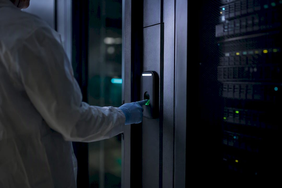 Hands accessing secured computational equipment