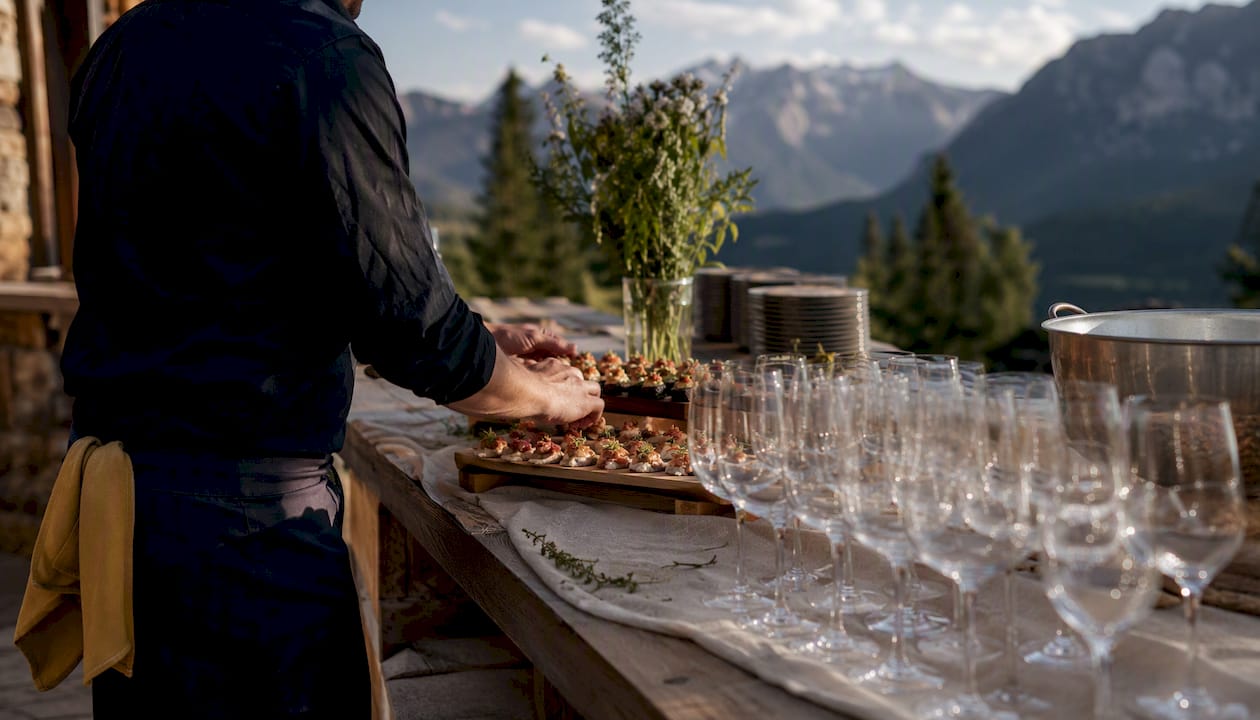 Close-up of catering setup at mountain outdoor wedding