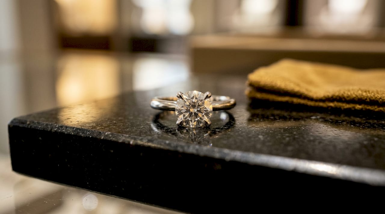 Macro four-prong diamond ring setting