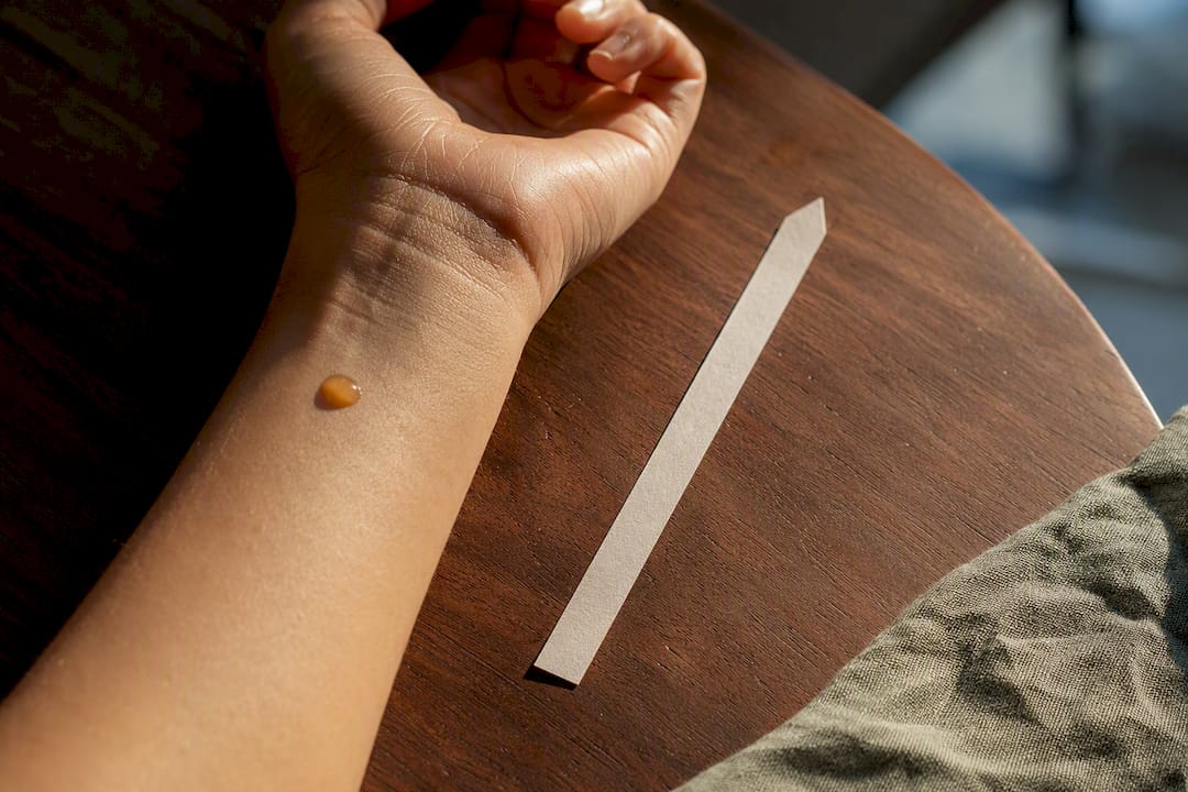 Essential oil drying down beside skin