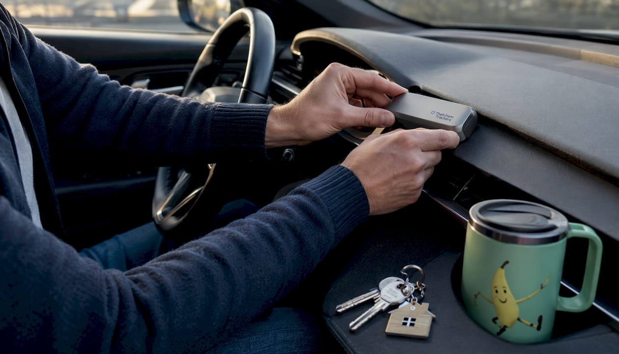 Close-up of GPS receiver in car interior with driver