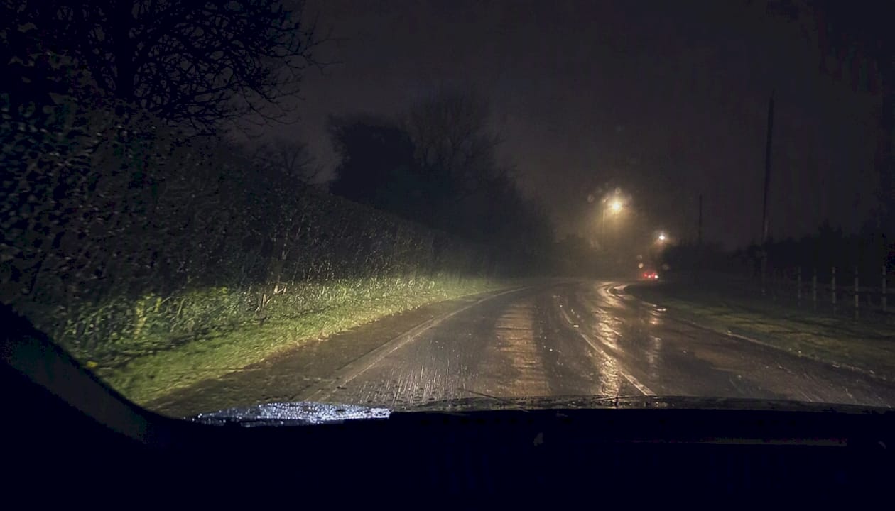 Night driving road view with vehicle lights