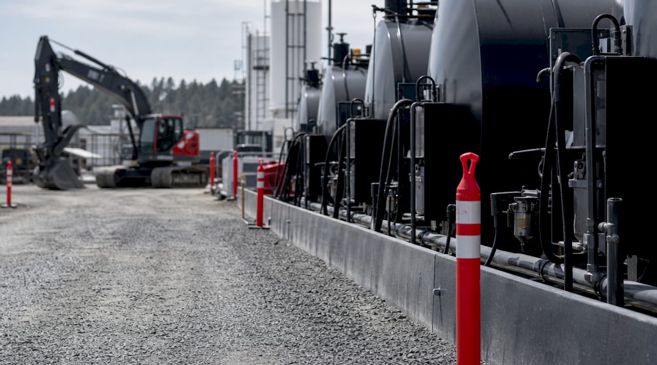 Fleet manager inspecting fueling operations