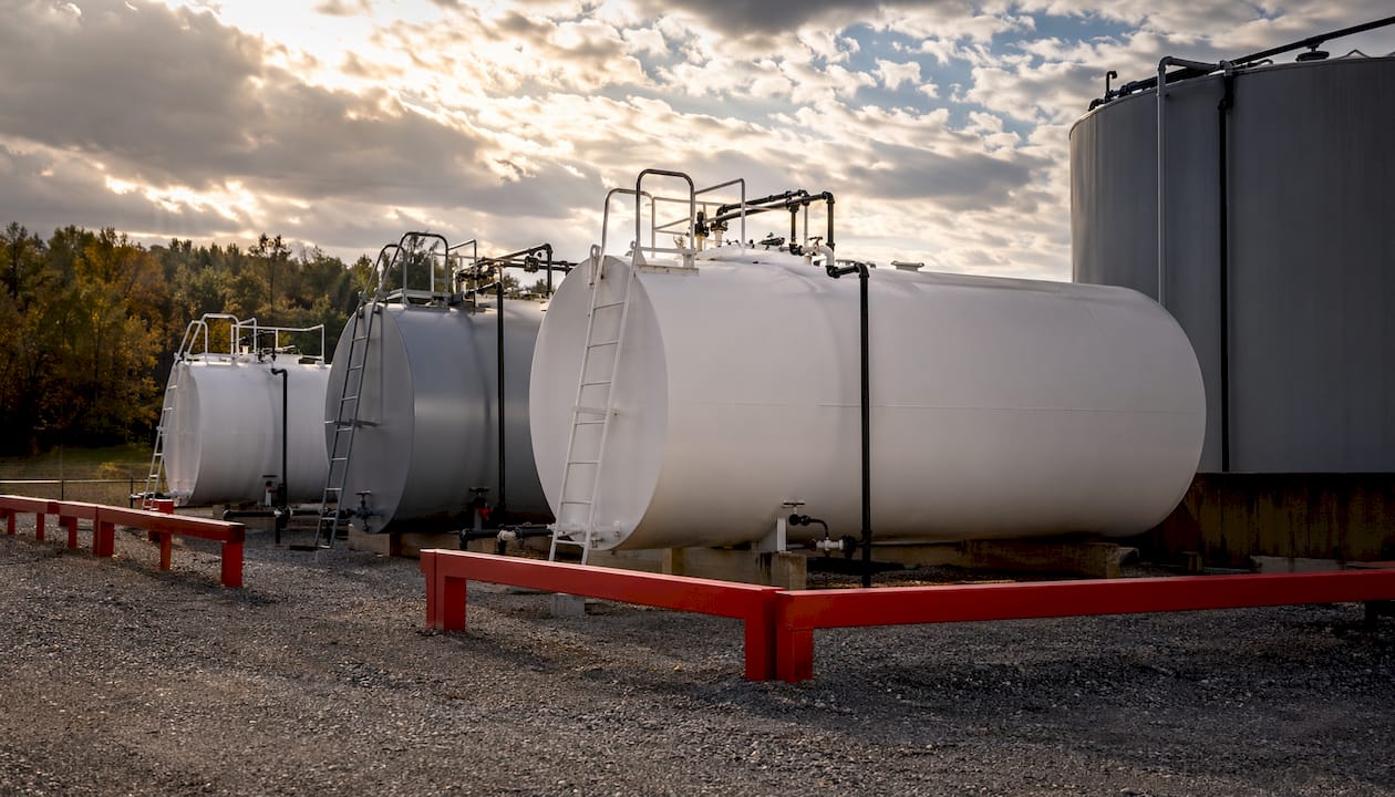 Outdoor view of several unbranded fuel storage tanks