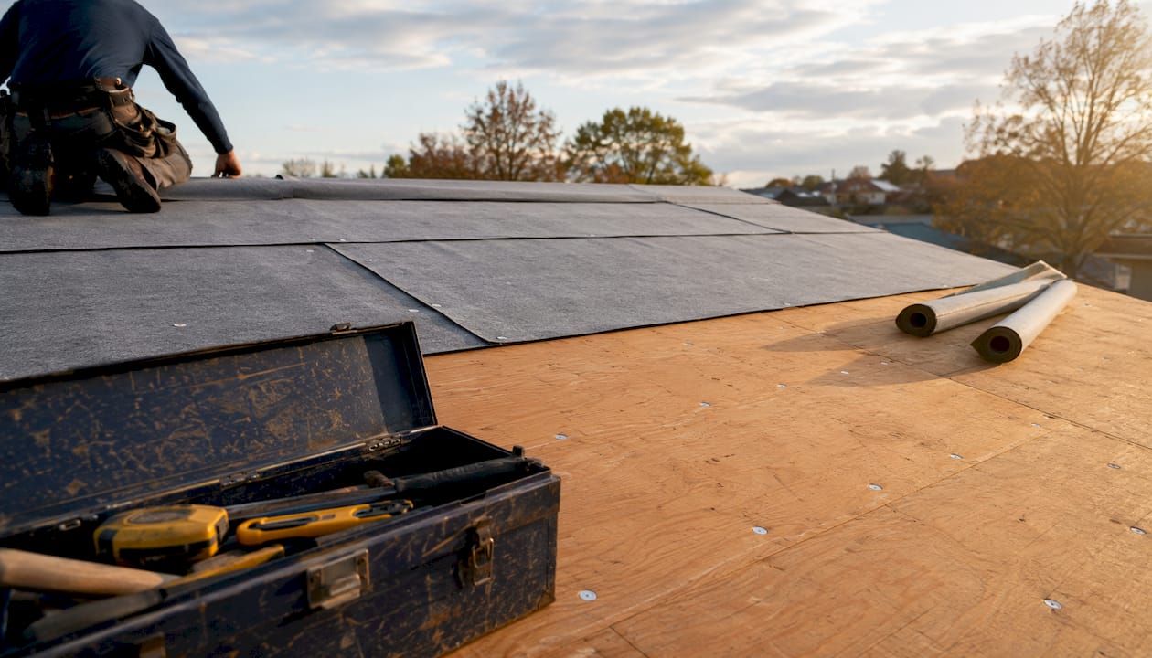 Double layer roofing felt on low-slope roof deck