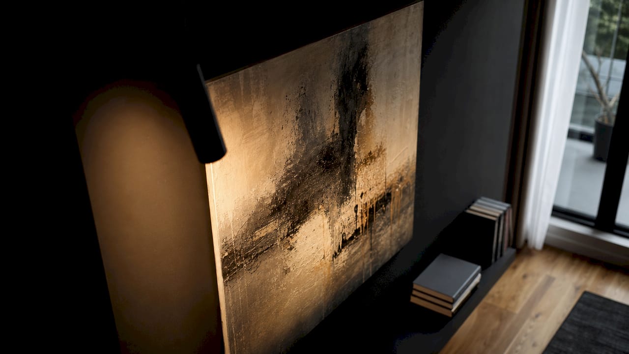 LED track light highlighting canvas texture