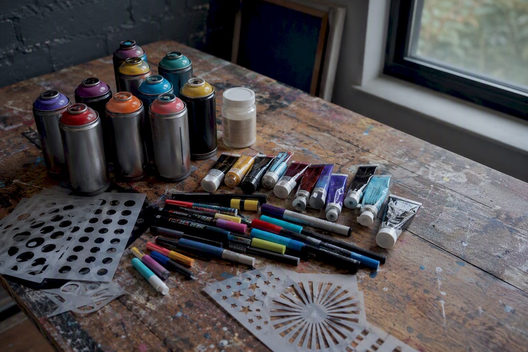 Pop art painting and sealing supplies laid out