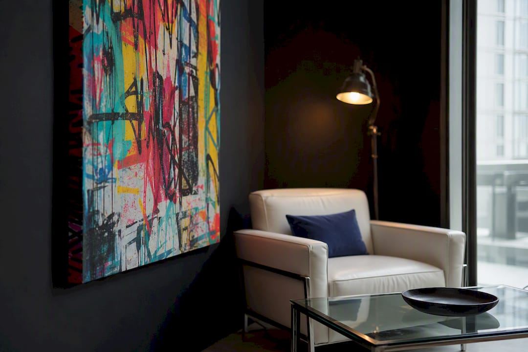 Stylish modern room with wrapped canvas art