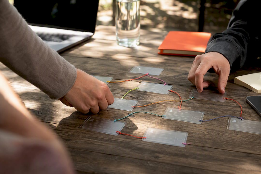 Hands syncing data cards on board