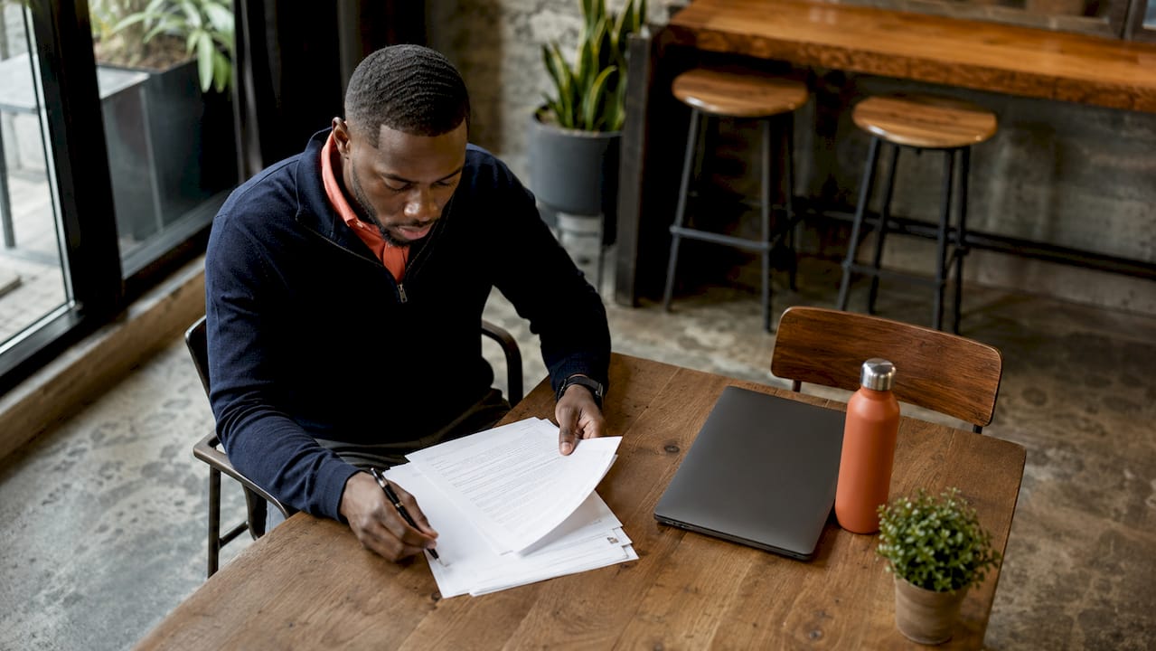 Procurement officer reviewing contract thresholds