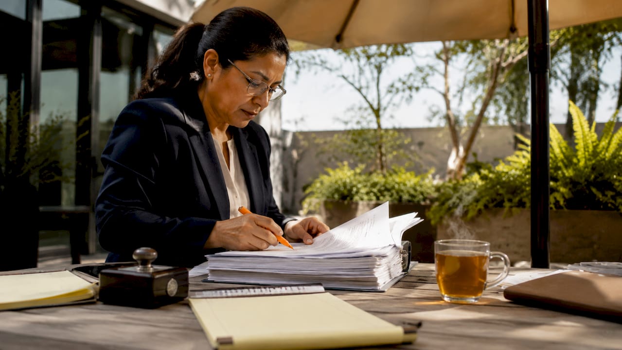 Contracting officer reviewing contract documents