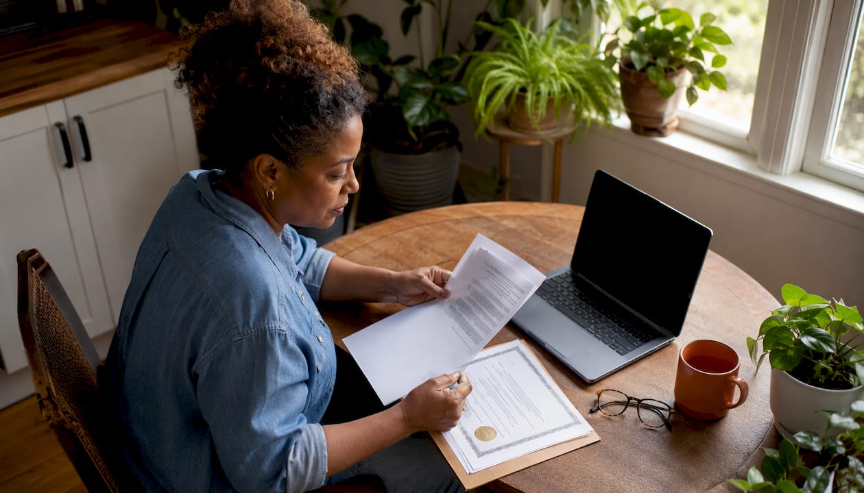Contractor verifying licensing paperwork