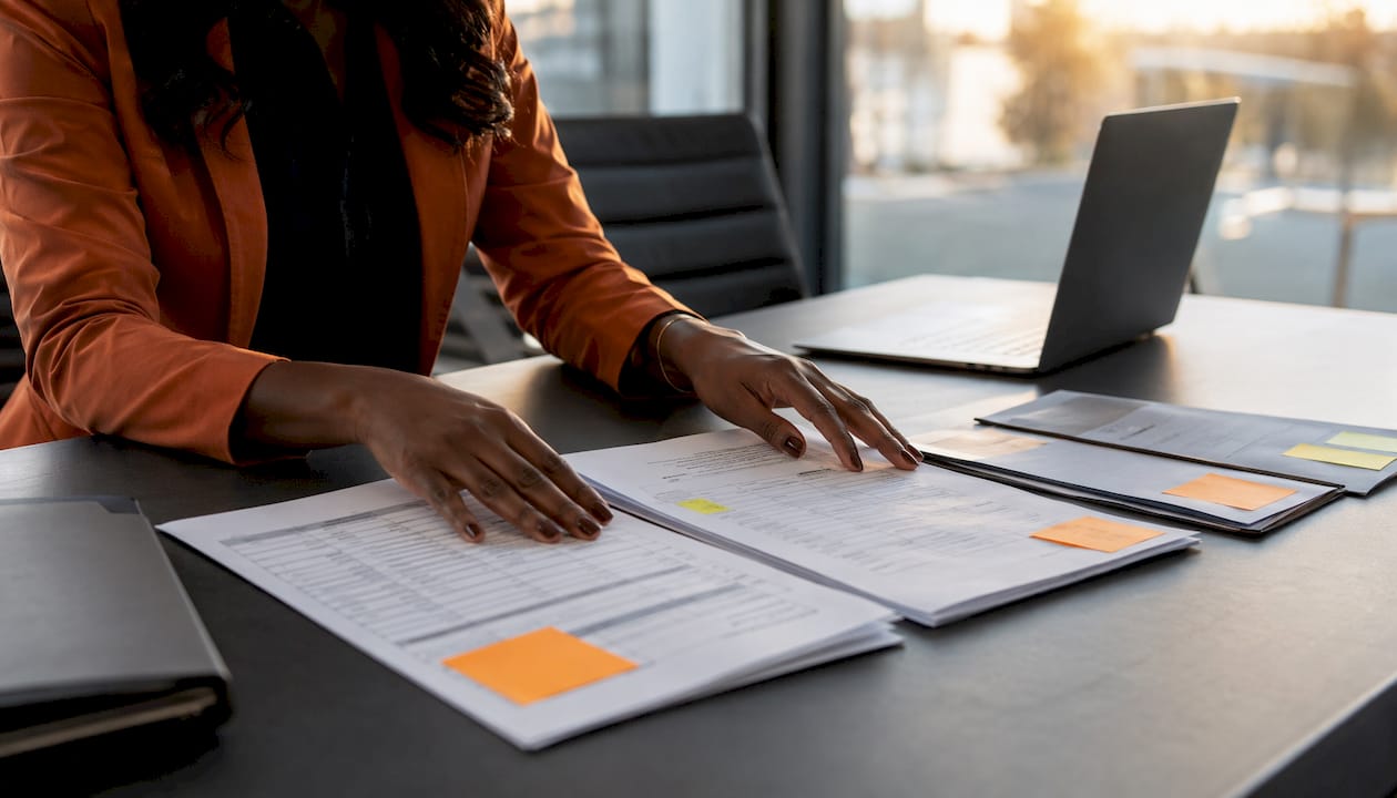 Hands pointing at workflow and pricebook docs