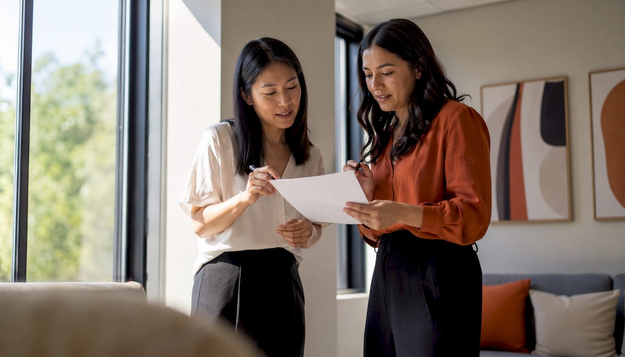 Hiring manager and recruiter discussing intake template