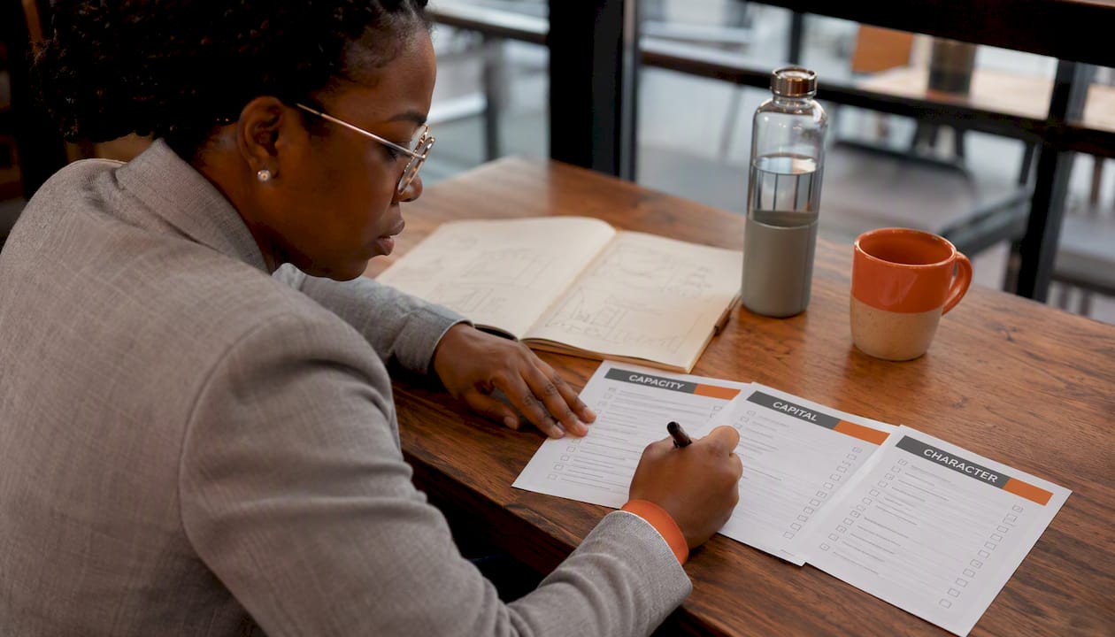 Project manager evaluating subcontractor prequalification forms