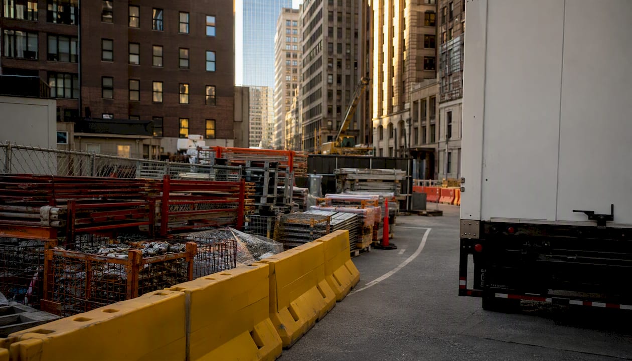 Urban construction site with staging and access constraints