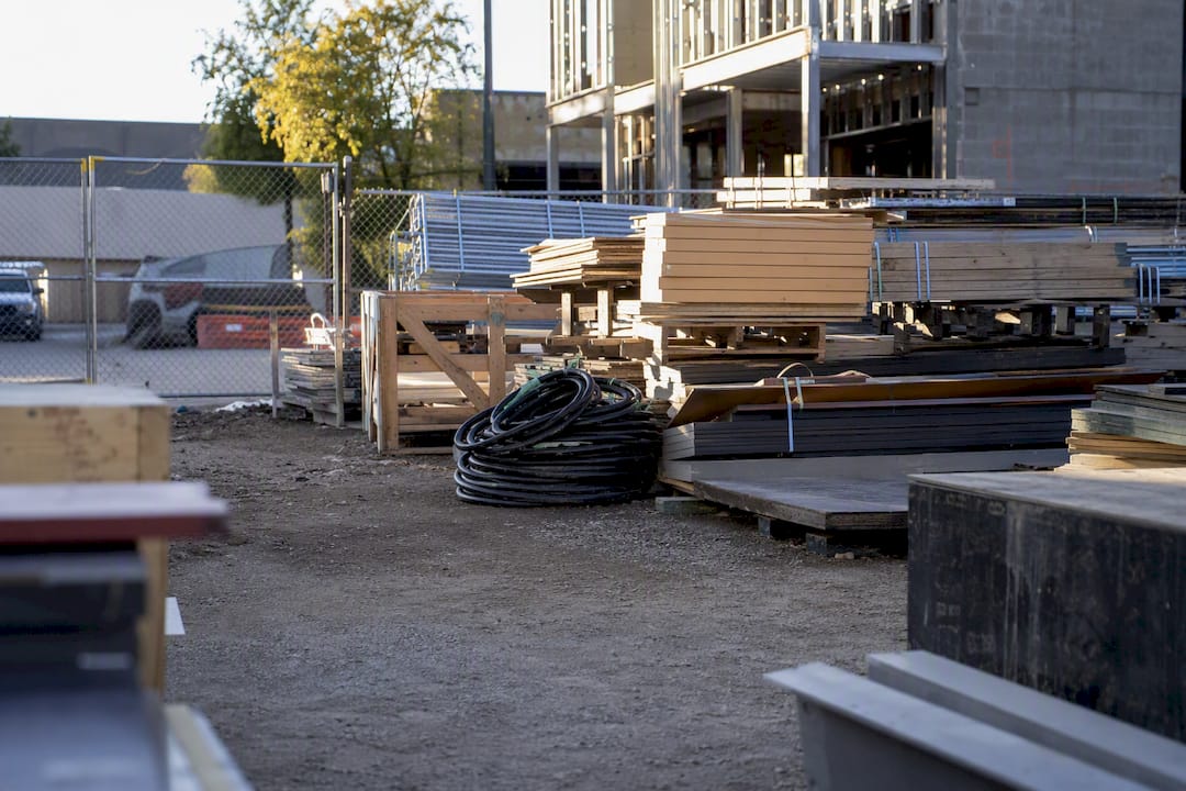 Crowded staging area with blocked access paths