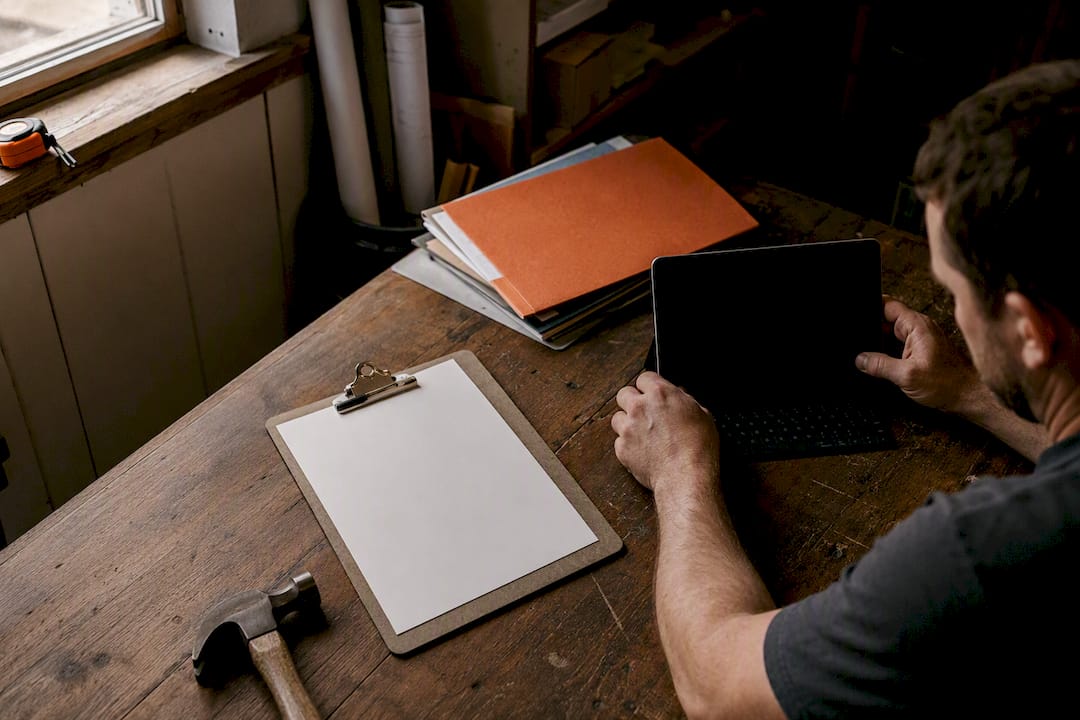 Small contractor office workspace with tools