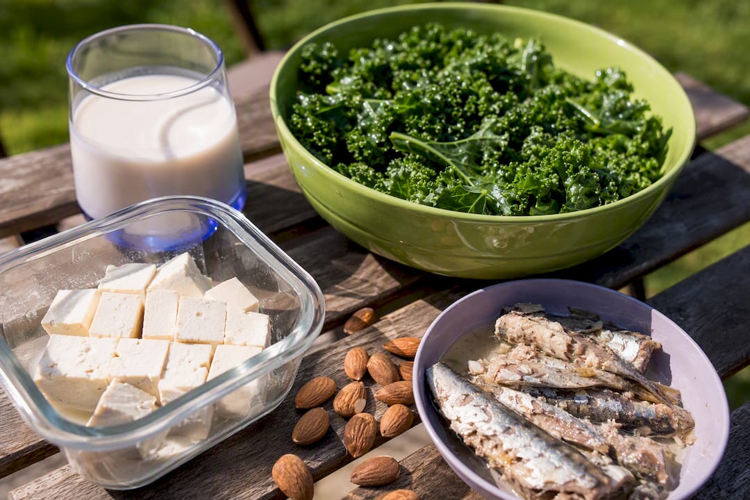 Close-up of calcium-rich foods on kitchen table