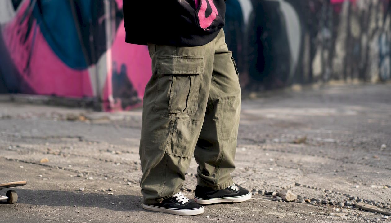 Olive cargo pants in streetwear outfit