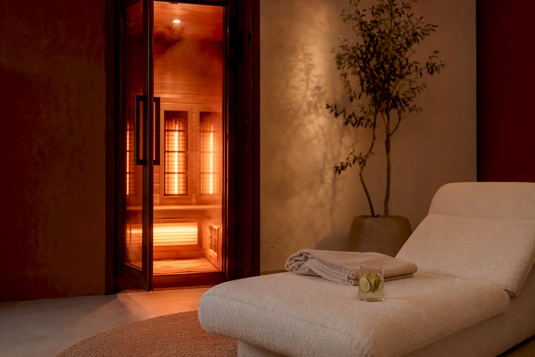 Infrared sauna door open with recovery bench