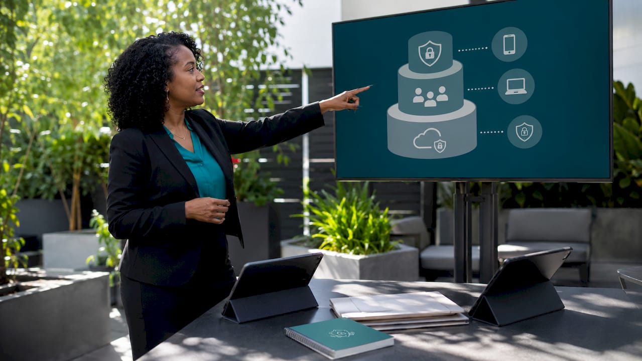 Woman explaining mobile security service tiers