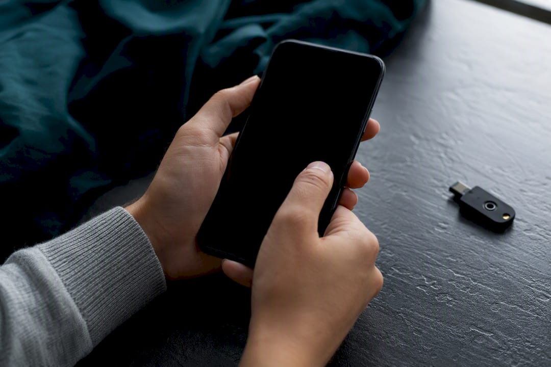 Hands configuring phone security settings