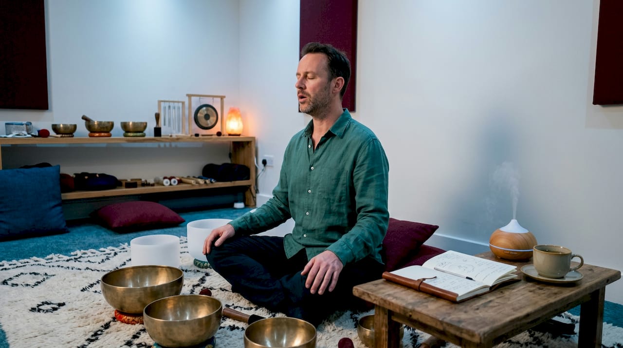 Man chanting activating vagus nerve at home