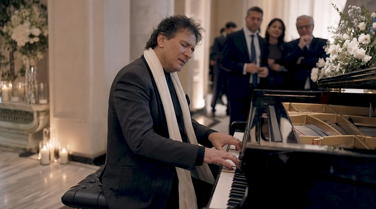 Emotional wedding pianist performing live
