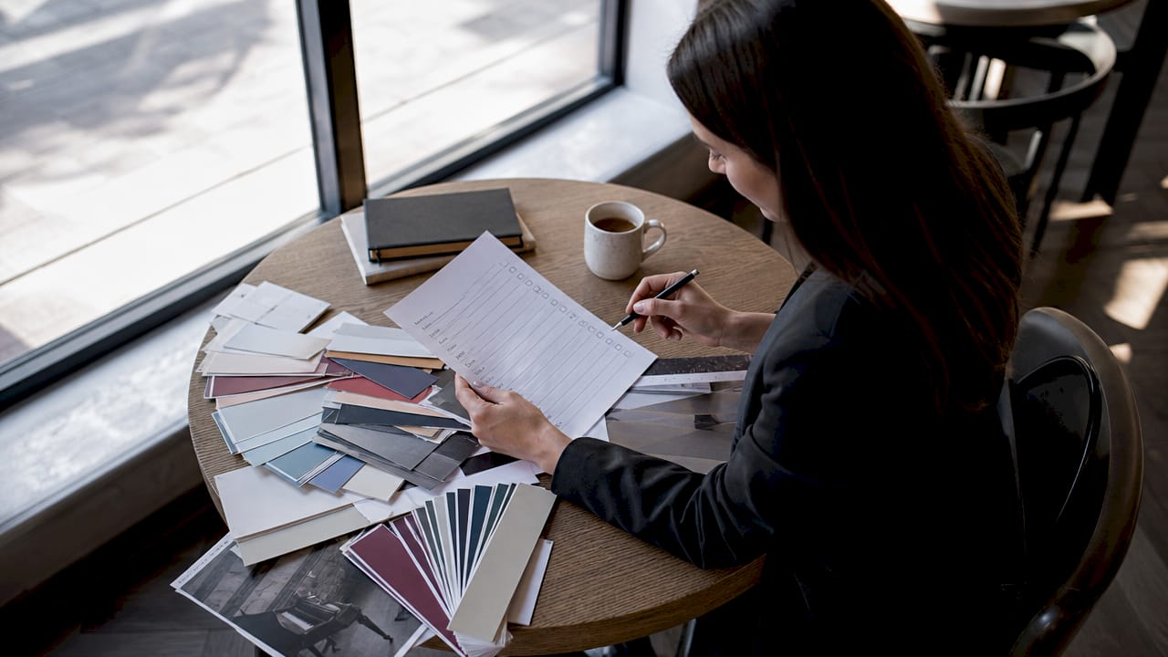 Event planner reviewing corporate music checklist