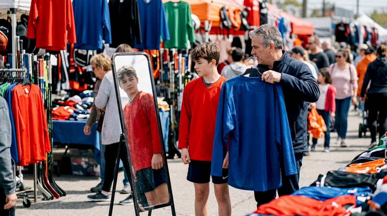 Teen trying youth and adult hockey jerseys
