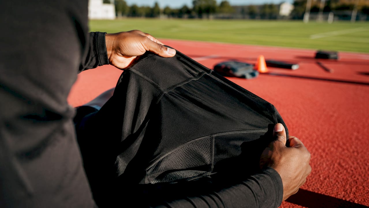 Close-up of reinforced stitching on hockey shirt fabric