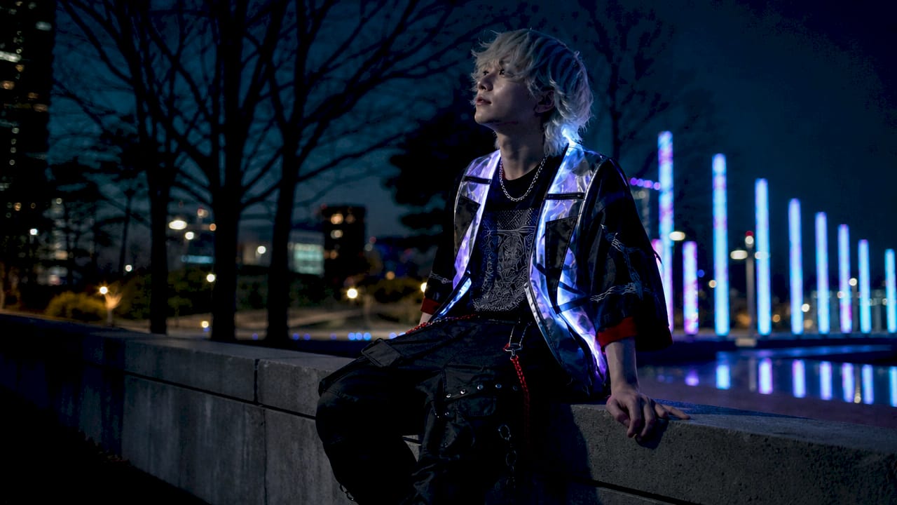 Person in neon-cyberpunk gaming fashion outdoors at night