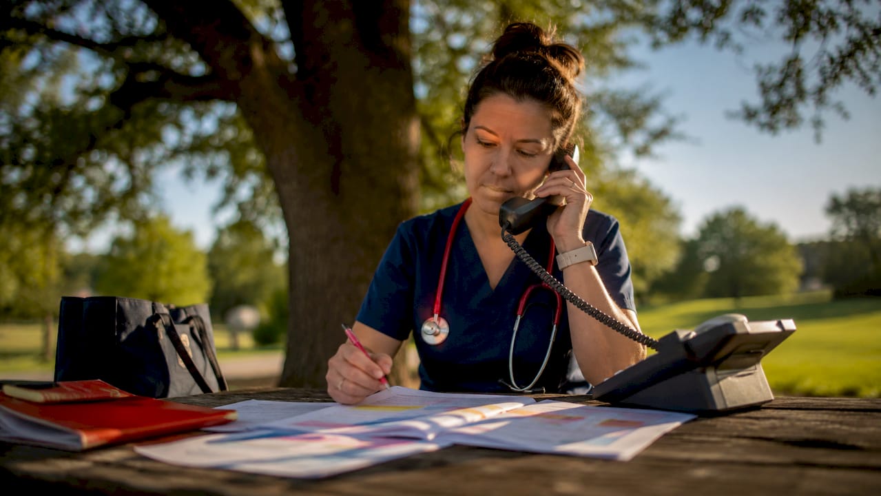 Nurse making peer-to-peer review call