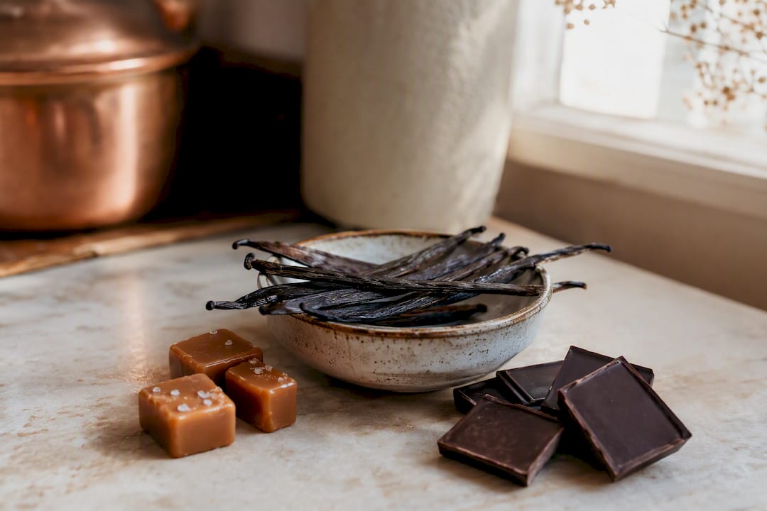 Vanilla beans, caramel, and chocolate as candle scent inspirations