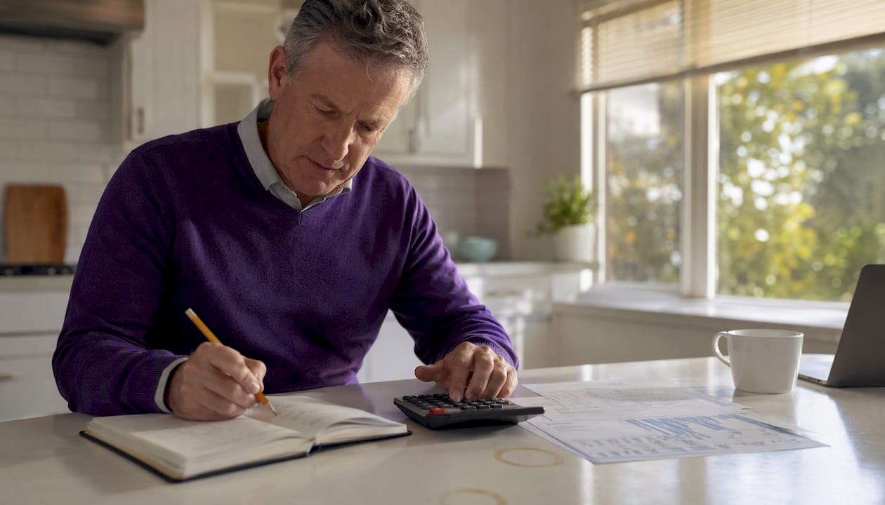 Accountant manually tallying commission payouts