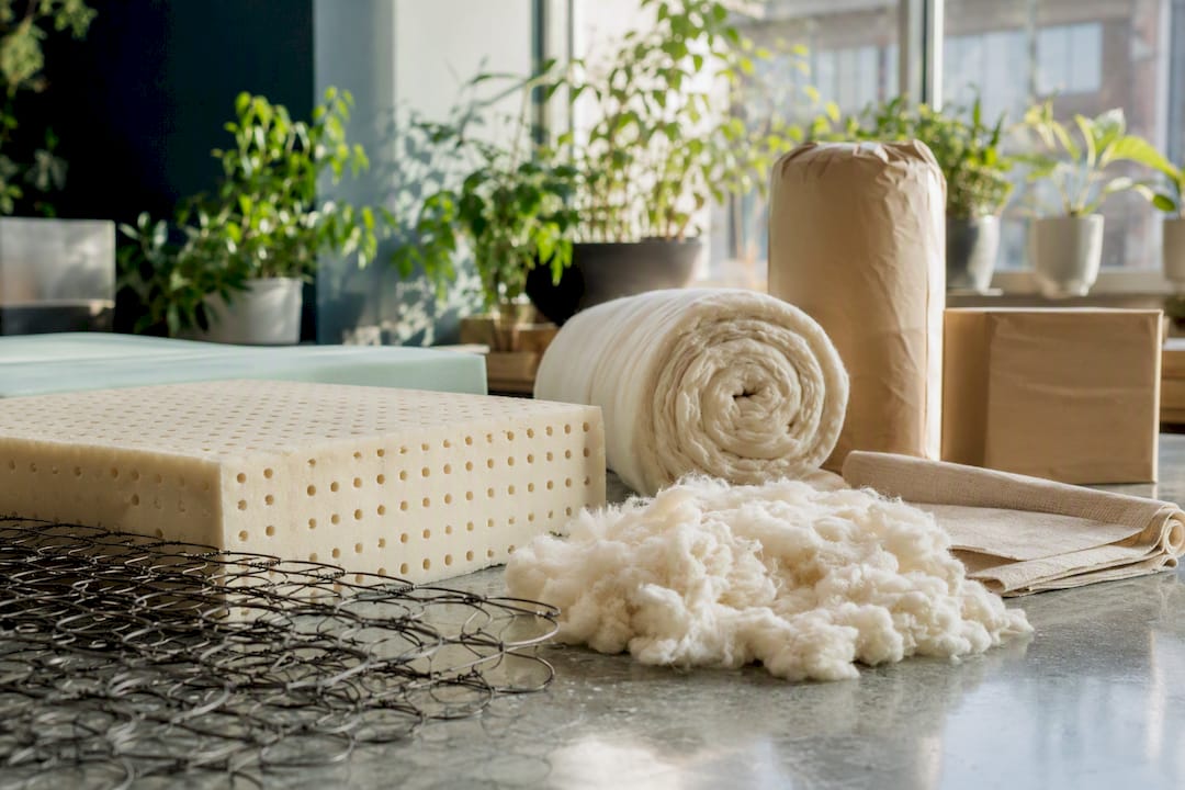 Raw sustainable mattress materials on table
