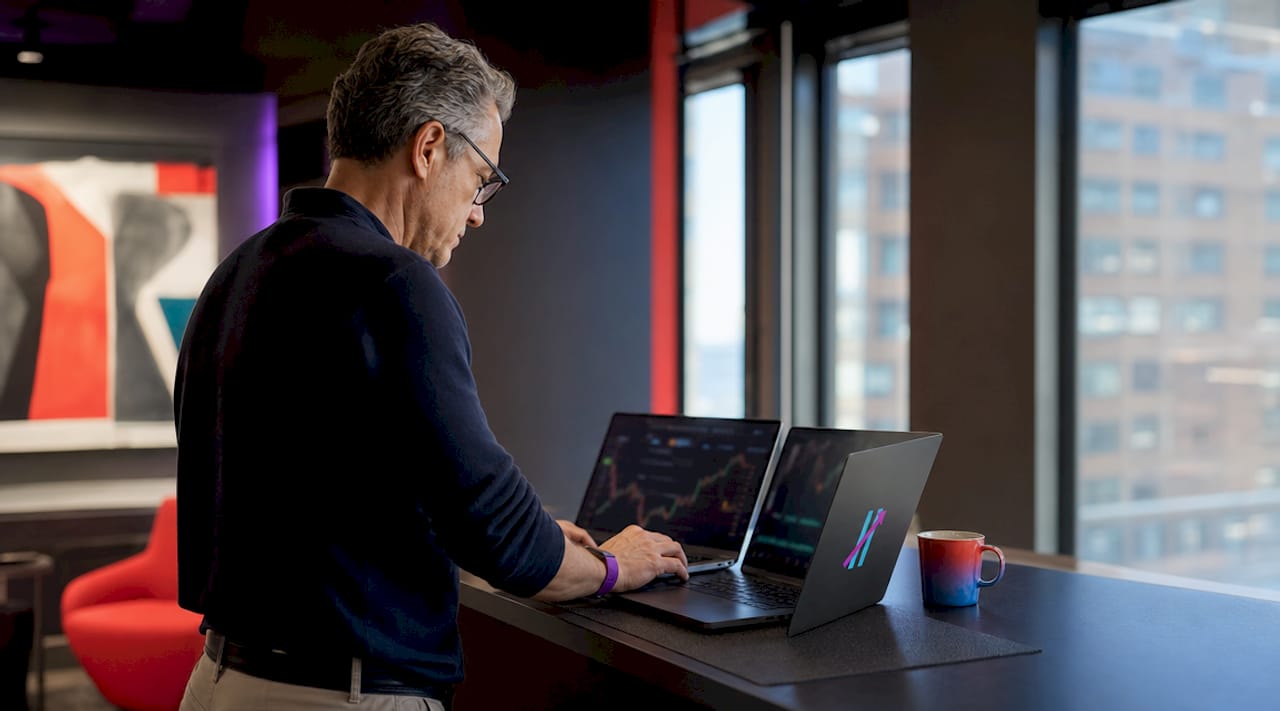 Trader working on bracket orders in office
