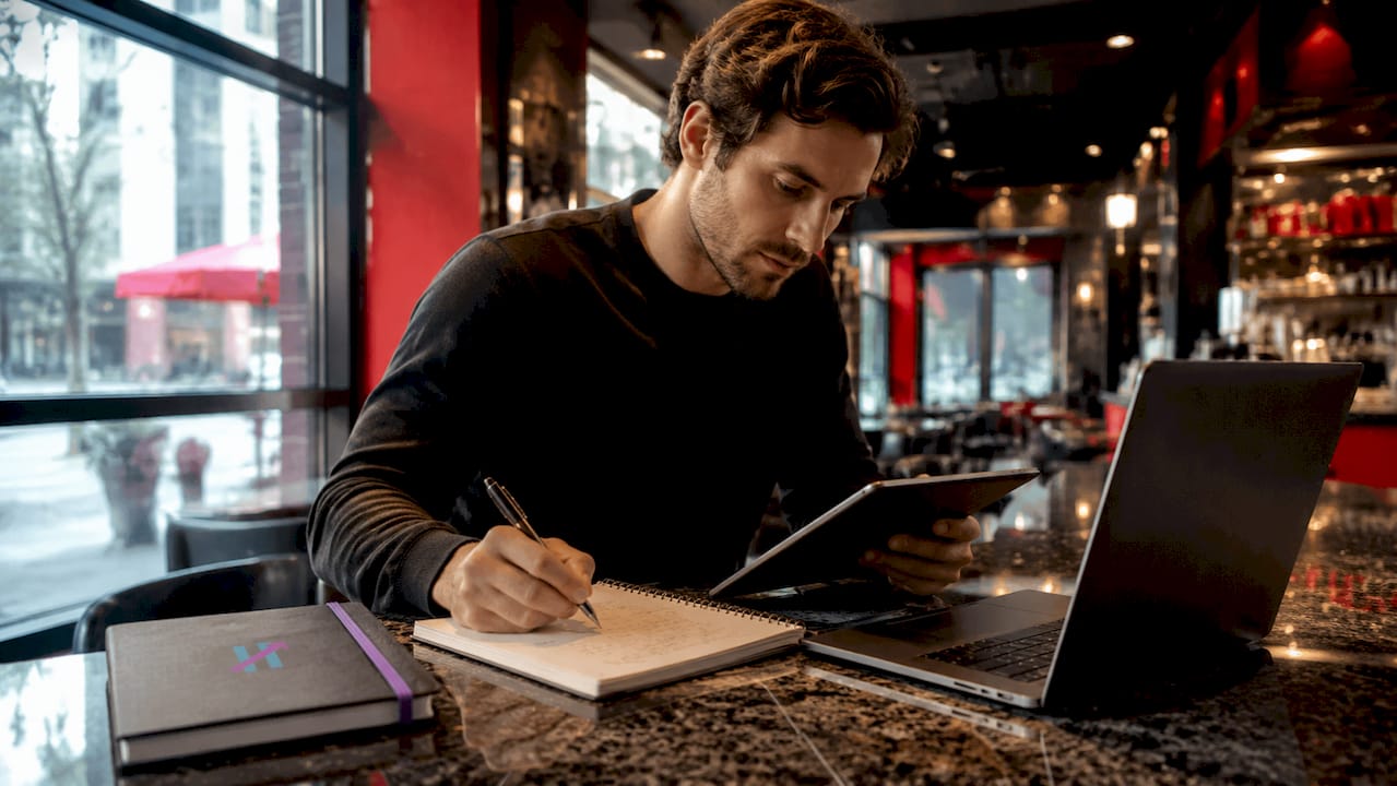 Trader working on strategy backtesting at home desk