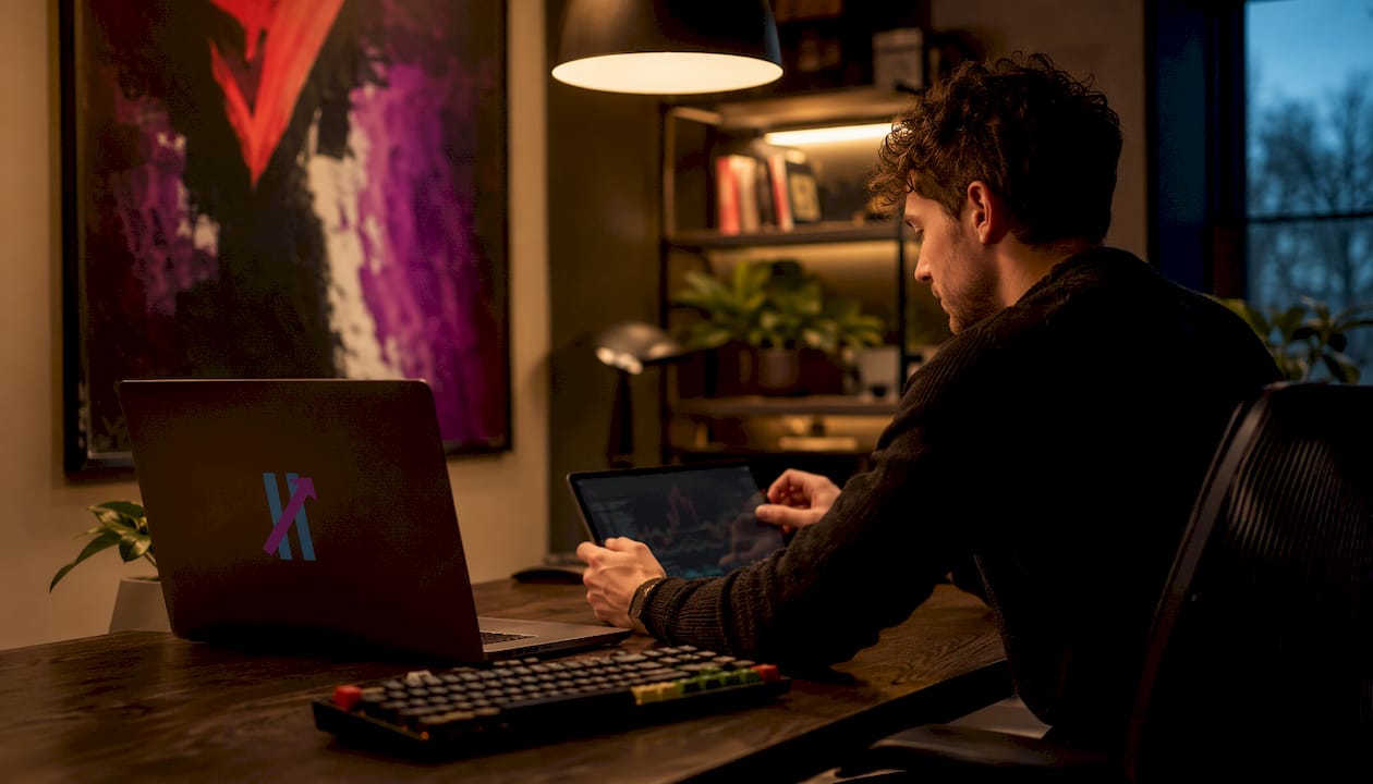 Side view of trader using tablet in office