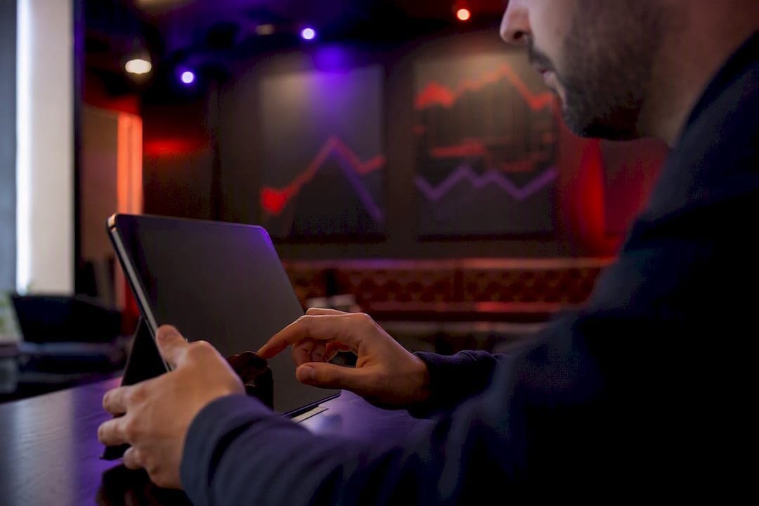 Trader adjusting market trend controls