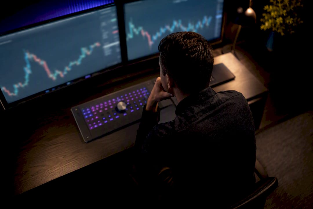 Trader comparing intraday market charts